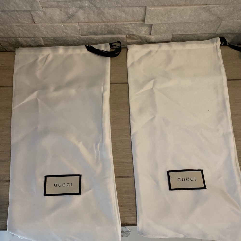 Set of 2 Gucci dust bags.